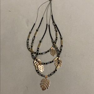 New gold/black Monstera beaded necklace